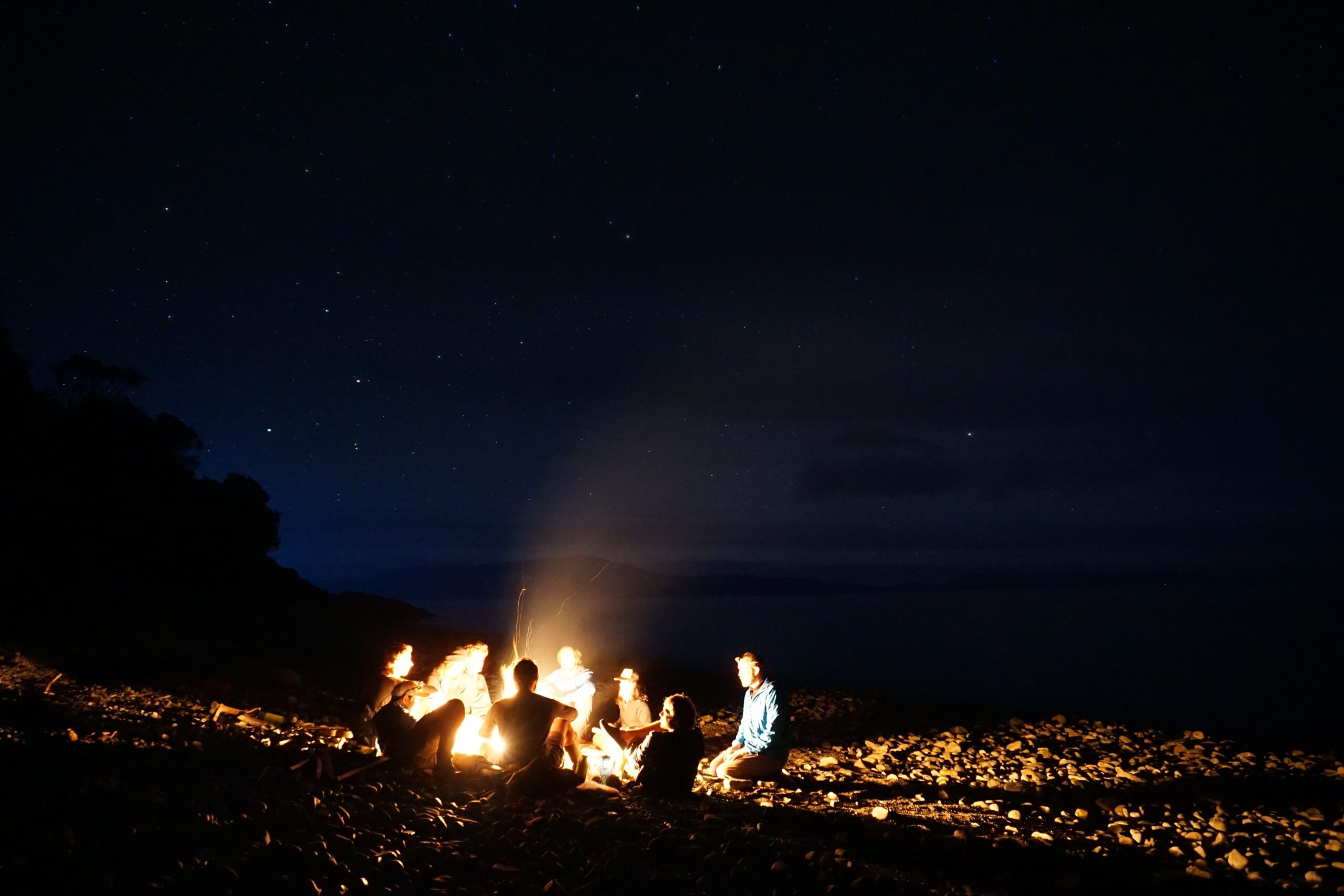 Sittng around a campfire Sittng around a campfire