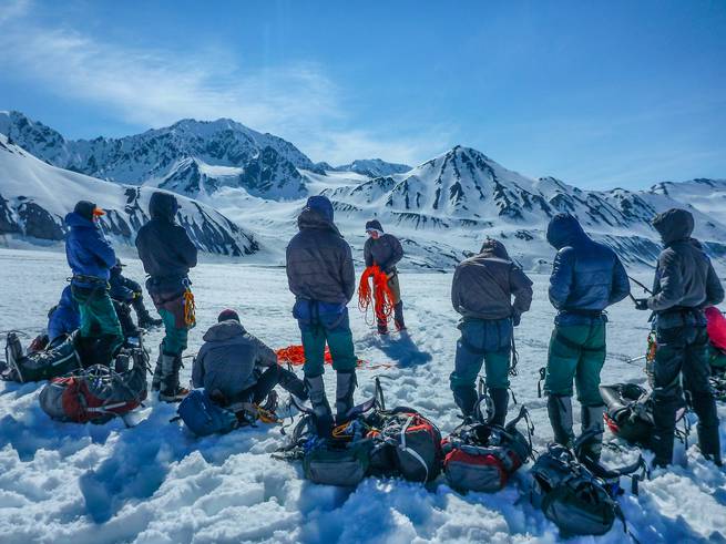 Naval Academy students on a NOLS Custom Education course prepare for a day of mountaineering in Alaska.