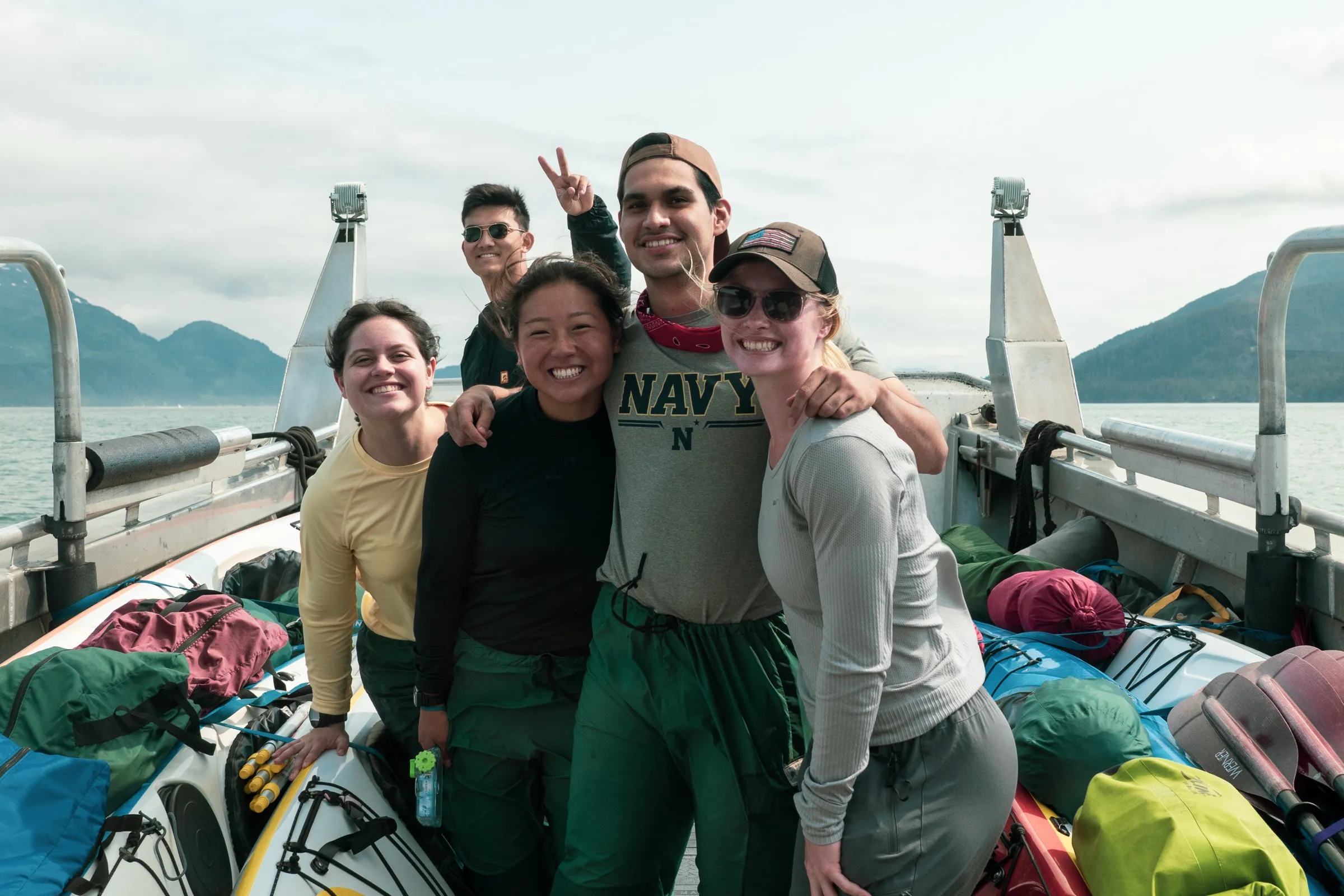 Team collaboration during a wilderness expedition in Alaska