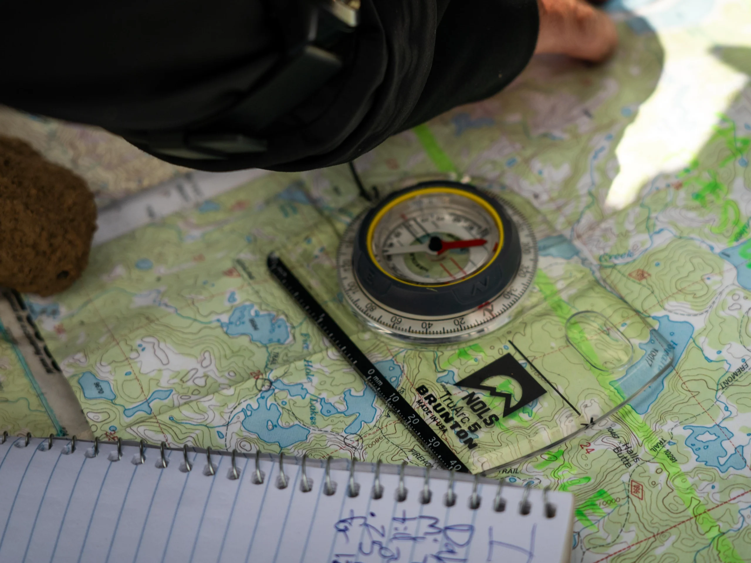 a compass sits on a map